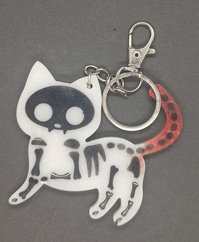 chat squelette porte clé